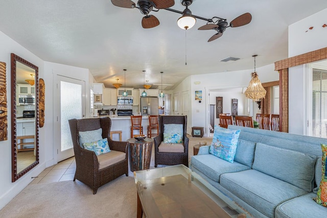 4771 Pepelani Lp Unit 921, Princeville, HI 96722 - living area featuring a ceiling fan, light tile patterned floors, and light colored carpet
