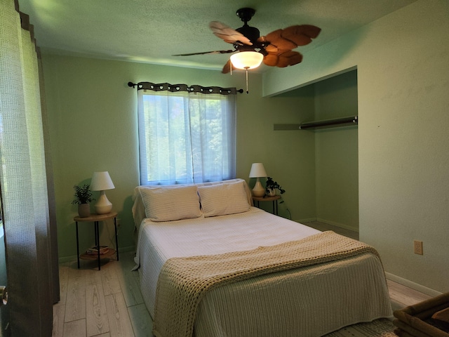 15-2687 Kaku St, Pahoa, HI 96778 - bedroom featuring light wood-style floors, baseboards, and a ceiling fan
