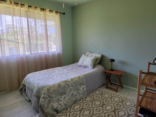 15-2687 Kaku St, Pahoa, HI 96778 - bedroom featuring wood finished floors