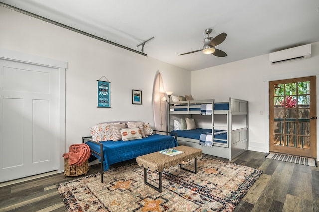 5413 Nakoa St, Koloa, HI 96756 - living area with a wall mounted AC, a ceiling fan, and dark wood finished floors