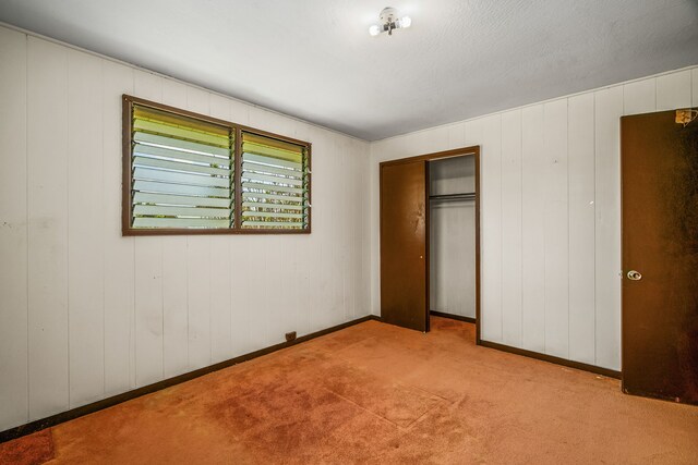 2492 Kino Rd, Kalaheo, HI 96741 - unfurnished bedroom featuring carpet, a closet, and baseboards