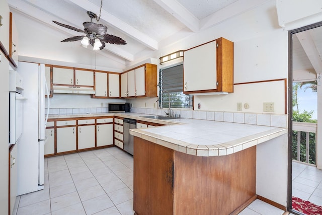 81-6267 Piko Rd, Captain Cook, HI 96704 - kitchen with a sink, stainless steel appliances, under cabinet range hood, a peninsula, and light tile patterned floors