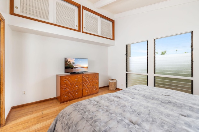 81-6267 Piko Rd, Captain Cook, HI 96704 - bedroom featuring light wood-style flooring, baseboards, a towering ceiling, and beamed ceiling