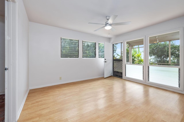 81-6267 Piko Rd, Captain Cook, HI 96704 - spare room with ceiling fan, baseboards, and light wood-type flooring