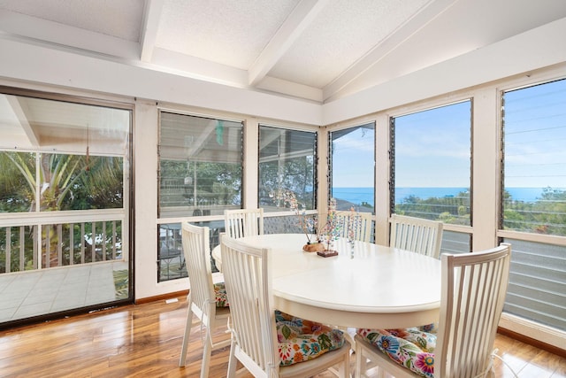 81-6267 Piko Rd, Captain Cook, HI 96704 - sunroom with wood finished floors, a water view, and a textured ceiling