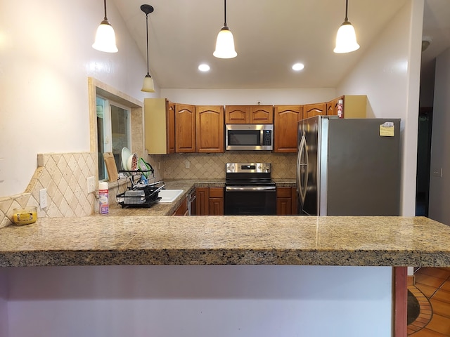 14-3431 Seadrift Rd, Pahoa, HI 96778 - kitchen featuring stainless steel appliances, decorative backsplash, pendant lighting, and lofted ceiling