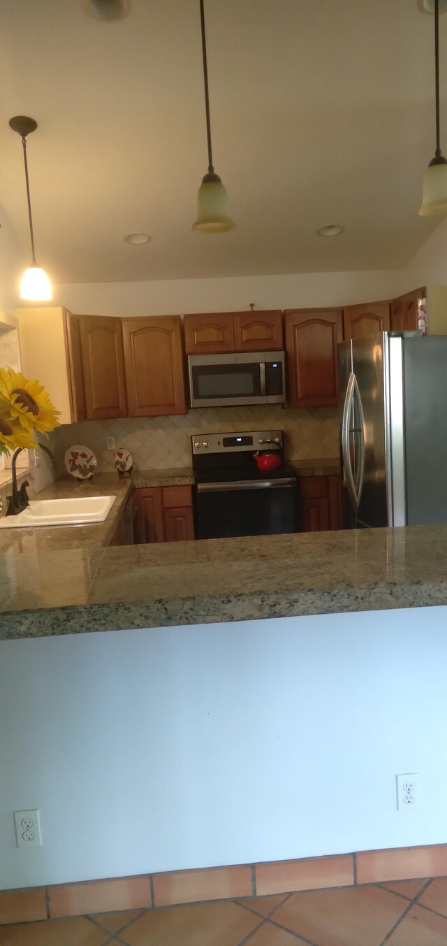 14-3431 Seadrift Rd, Pahoa, HI 96778 - kitchen with stainless steel appliances, a sink, tile countertops, tasteful backsplash, and decorative light fixtures