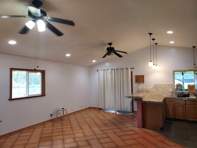 14-3431 Seadrift Rd, Pahoa, HI 96778 - kitchen with ceiling fan, backsplash, a peninsula, decorative light fixtures, and recessed lighting
