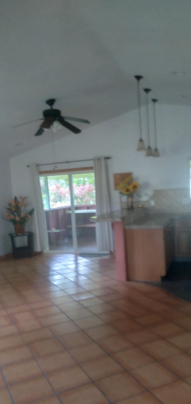 14-3431 Seadrift Rd, Pahoa, HI 96778 - living area featuring lofted ceiling, a ceiling fan, and light tile patterned flooring
