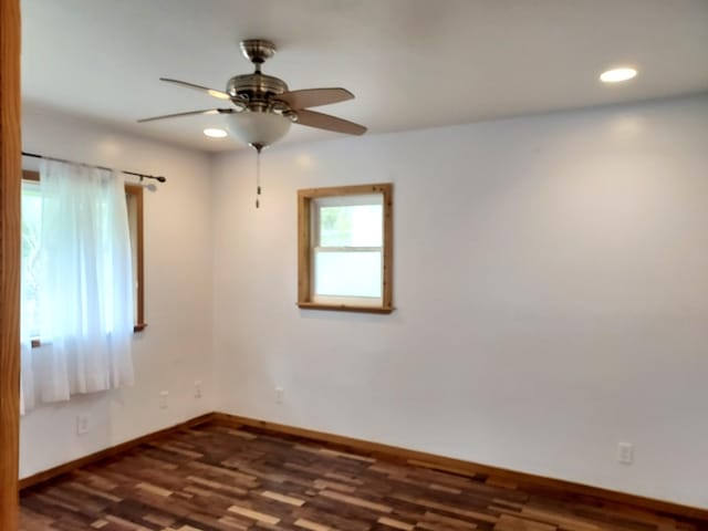 14-3431 Seadrift Rd, Pahoa, HI 96778 - unfurnished room with ceiling fan, baseboards, dark wood-style flooring, and recessed lighting