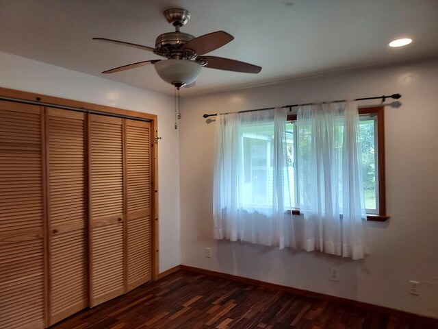 14-3431 Seadrift Rd, Pahoa, HI 96778 - unfurnished bedroom featuring a closet, dark wood-type flooring, baseboards, recessed lighting, and ceiling fan