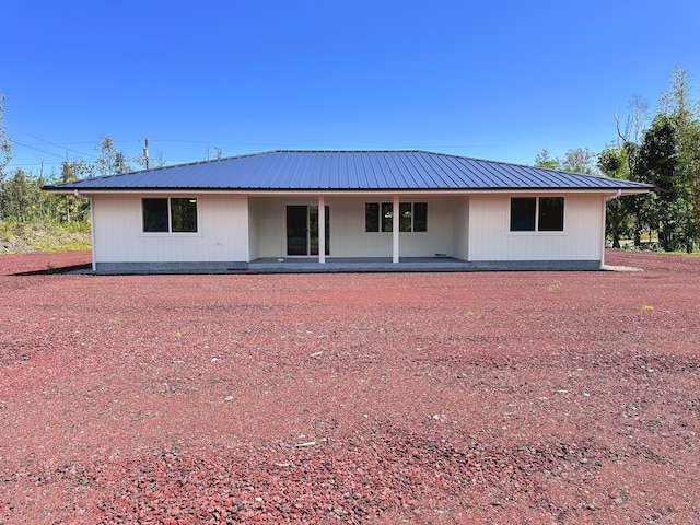 15-1622 3rd Ave, Keaau, HI 96749 - back of property with metal roof and a porch