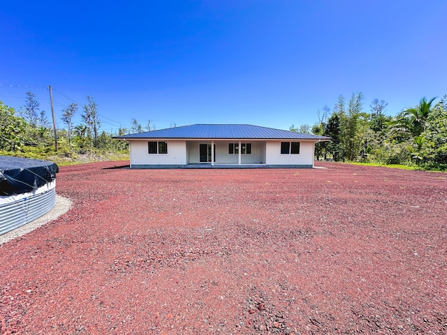 15-1622 3rd Ave, Keaau, HI 96749 - rear view of house featuring metal roof