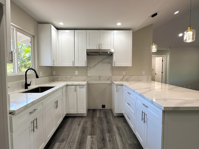 15-1622 3rd Ave, Keaau, HI 96749 - kitchen featuring a sink, a peninsula, white cabinetry, light stone countertops, and recessed lighting