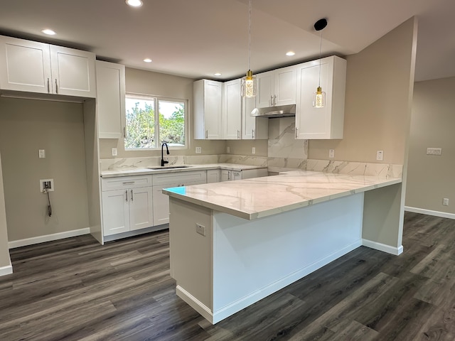 15-1622 3rd Ave, Keaau, HI 96749 - kitchen with under cabinet range hood, a peninsula, white cabinetry, and recessed lighting
