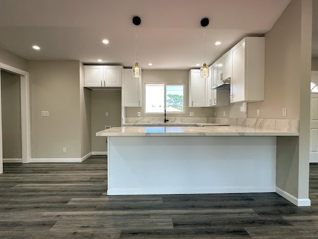 15-1622 3rd Ave, Keaau, HI 96749 - kitchen with under cabinet range hood, a peninsula, white cabinets, dark wood-type flooring, and recessed lighting
