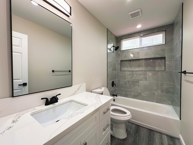 15-1622 3rd Ave, Keaau, HI 96749 - full bathroom with toilet, vanity, shower / bathtub combination, and wood finished floors