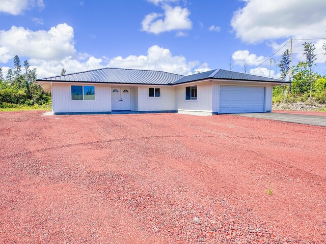 15-1622 3rd Ave, Keaau, HI 96749 - ranch-style house with driveway, a garage, and metal roof