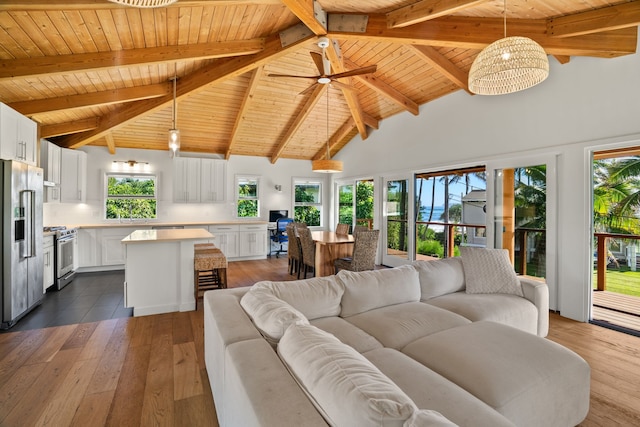 5-7084 Kuhio Hwy, Hanalei, HI 96714 - living area featuring wooden ceiling with exposed beams, high vaulted ceiling, and dark wood finished floors