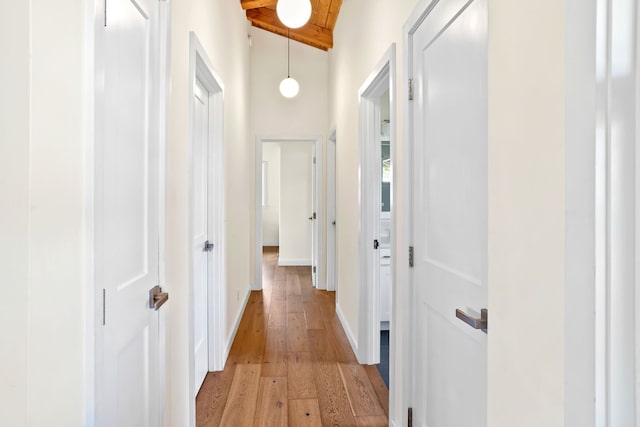 5-7084 Kuhio Hwy, Hanalei, HI 96714 - hall with light wood-style floors, baseboards, high vaulted ceiling, and wooden ceiling with exposed beams