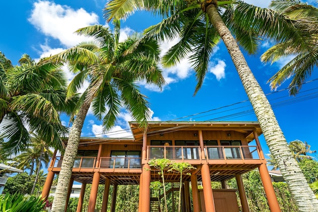 5-7084 Kuhio Hwy, Hanalei, HI 96714 - back of property with a deck and board and batten siding