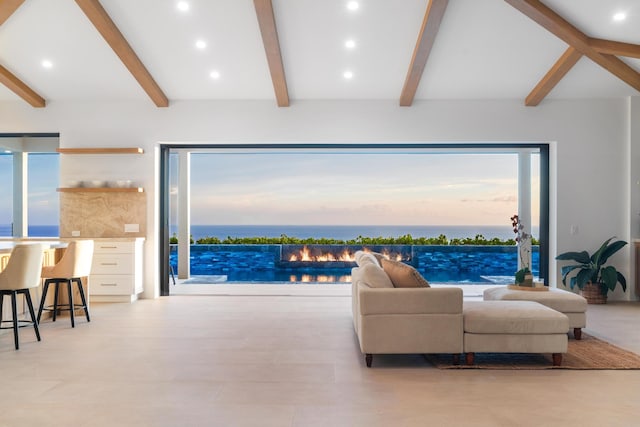 78-7029 Ola Mau St, Kailua-Kona, HI 96740 - living room featuring beam ceiling, recessed lighting, and a water view