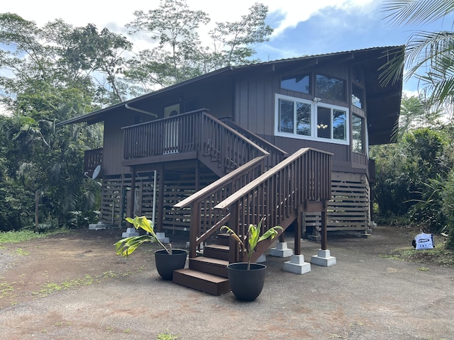 14-3578 Kauai Rd, Pahoa, HI 96778 - back of house featuring stairs