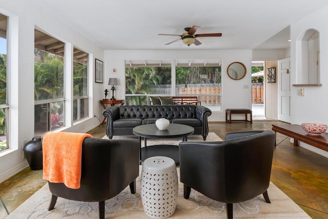 68-1884 Kaupapa Pl, Waikoloa, HI 96738 - living area featuring healthy amount of natural light, ceiling fan, and finished concrete floors
