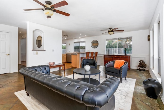 68-1884 Kaupapa Pl, Waikoloa, HI 96738 - living room with ceiling fan, plenty of natural light, and finished concrete floors