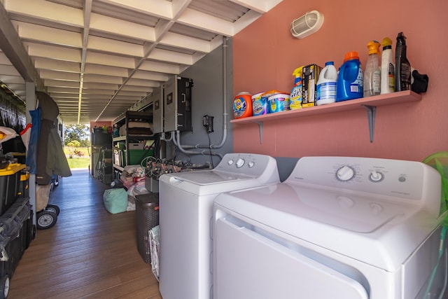 32-491 Piha Kahuku Rd, Ninole, HI 96773 - laundry area with washing machine and clothes dryer and wood-type flooring
