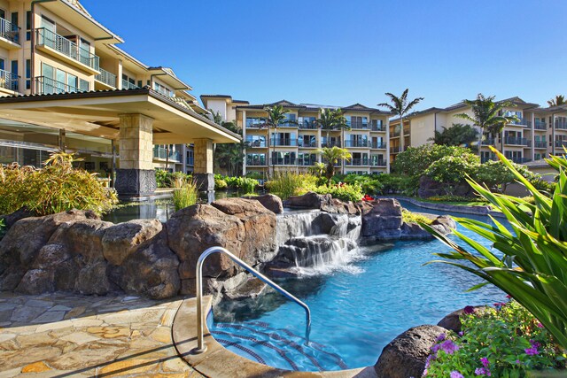 4-820 Kuhio Hwy Unit C106, Kapaa, HI 96746 - view of swimming pool featuring a garden pond