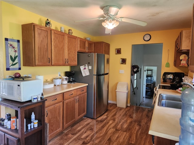 14-3449 Mauna Kea Rd, Pahoa, HI 96778 - kitchen featuring white microwave, freestanding refrigerator, dark wood-type flooring, and a ceiling fan