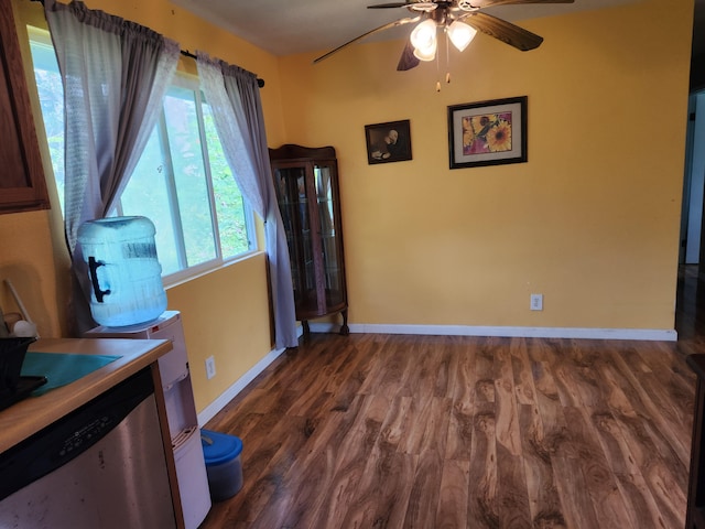 14-3449 Mauna Kea Rd, Pahoa, HI 96778 - dining space featuring ceiling fan, baseboards, and dark wood-type flooring