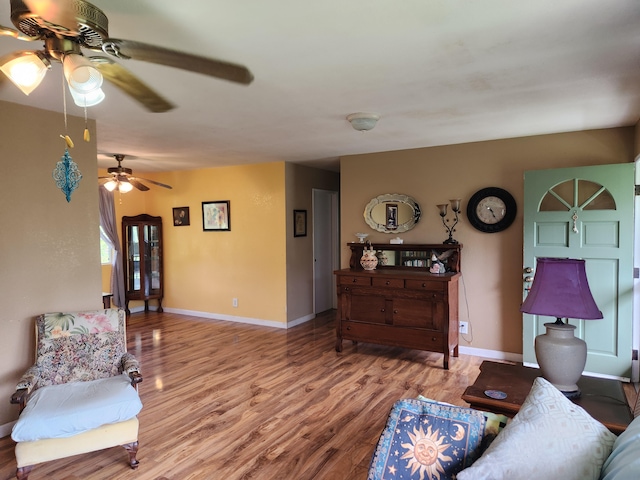 14-3449 Mauna Kea Rd, Pahoa, HI 96778 - living room with a ceiling fan, wood finished floors, and baseboards