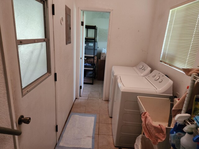 14-3449 Mauna Kea Rd, Pahoa, HI 96778 - washroom featuring washing machine and clothes dryer, light tile patterned flooring, and electric panel