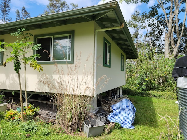 14-3449 Mauna Kea Rd, Pahoa, HI 96778 - view of property exterior featuring a yard