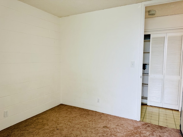 4156 Rice St Unit 411, Lihue, HI 96766 - spare room featuring carpet flooring and a smoke detector