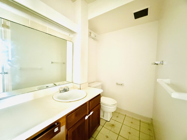 4156 Rice St Unit 411, Lihue, HI 96766 - bathroom featuring vanity, toilet, and baseboards