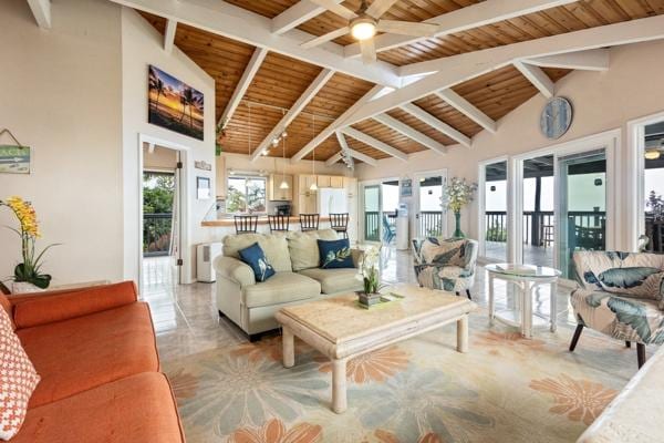 87-3216 Ama Rd, Captain Cook, HI 96704 - living area featuring a wood ceiling with exposed beams, a ceiling fan, and high vaulted ceiling