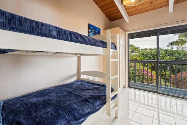 87-3216 Ama Rd, Captain Cook, HI 96704 - bedroom with wooden ceiling, tile patterned flooring, and access to outside