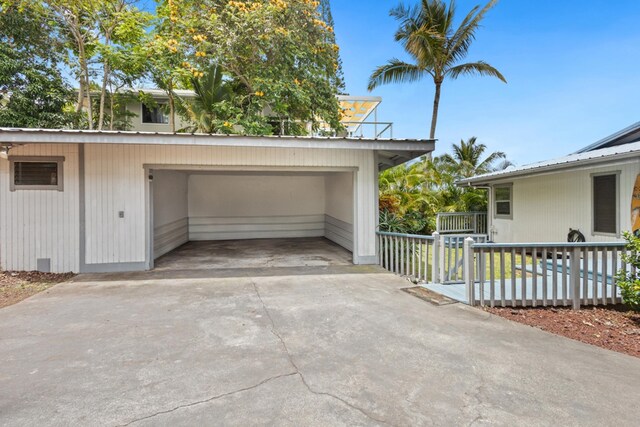 87-3216 Ama Rd, Captain Cook, HI 96704 - garage featuring concrete driveway