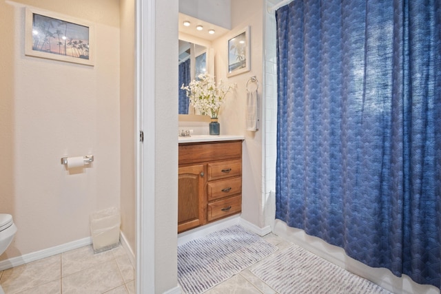 87-3216 Ama Rd, Captain Cook, HI 96704 - bathroom featuring tile patterned floors, vanity, and a shower with shower curtain