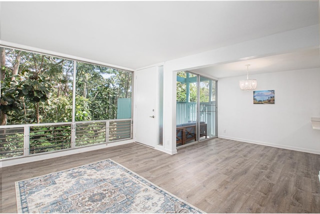 188 Hale St Unit 3C, Hilo, HI 96720 - unfurnished sunroom with a chandelier