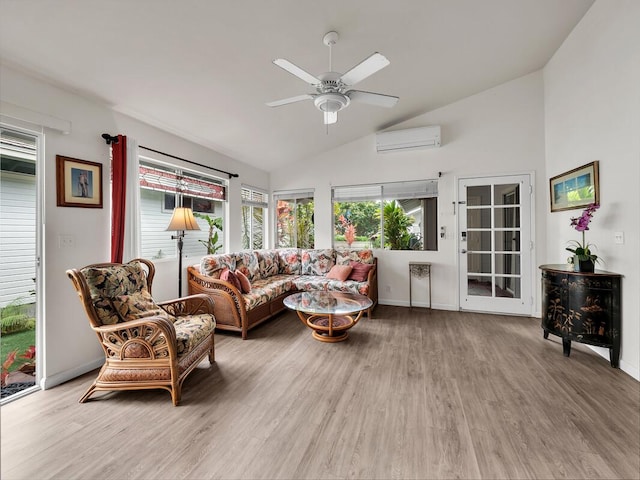 75-252 Nani Kailua Dr Unit 27, Kailua-Kona, HI 96740 - living room with a wall unit AC, a ceiling fan, wood finished floors, baseboards, and high vaulted ceiling