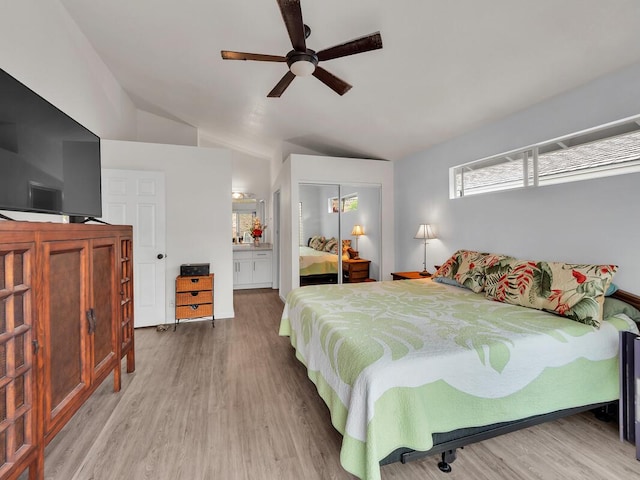 75-252 Nani Kailua Dr Unit 27, Kailua-Kona, HI 96740 - bedroom with lofted ceiling, wood finished floors, ensuite bathroom, a closet, and ceiling fan