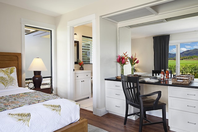2750 Milo Hae Lp, Koloa, HI 96756 - bedroom with dark wood-type flooring and an office area