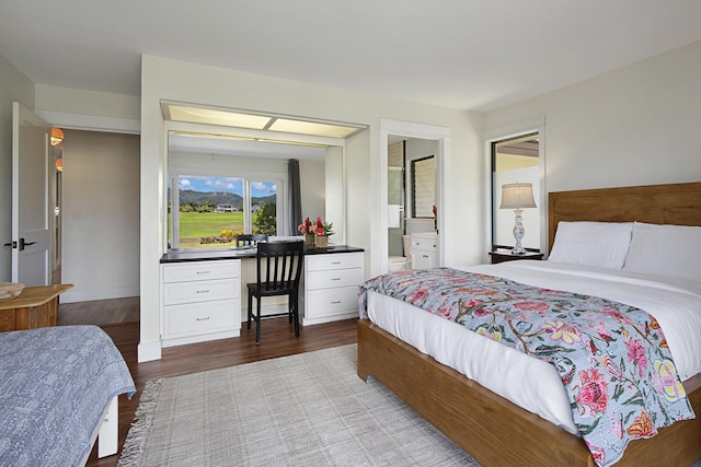 2750 Milo Hae Lp, Koloa, HI 96756 - bedroom with wood finished floors and a desk