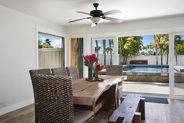 2750 Milo Hae Lp, Koloa, HI 96756 - dining area with a ceiling fan, plenty of natural light, and wood finished floors