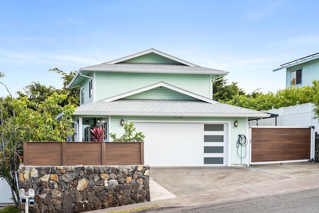 76-206 Kealoha St Unit 2A, Kailua-Kona, HI 96740 - view of front of house with roof with shingles and concrete driveway