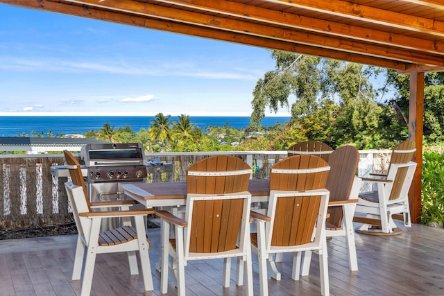 76-206 Kealoha St Unit 2A, Kailua-Kona, HI 96740 - wooden deck featuring outdoor dining space and a water view